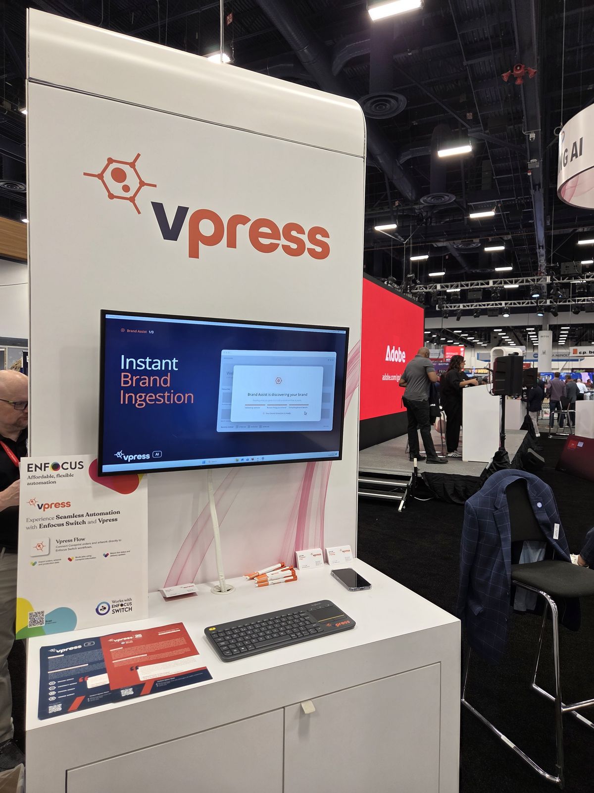 The Vpress pod at PRINTING United Expo 2026, with Enfocus Switch automation signage